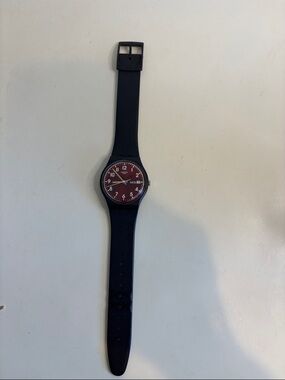 Swatch Men's Black Strap Watch with Burgundy Dial